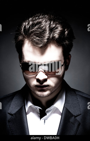 Portrait of a Young Man with Sunglasses Stock Photo