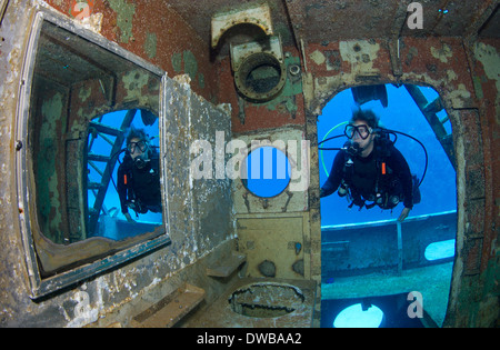 Diver and underwater reflection. Stock Photo