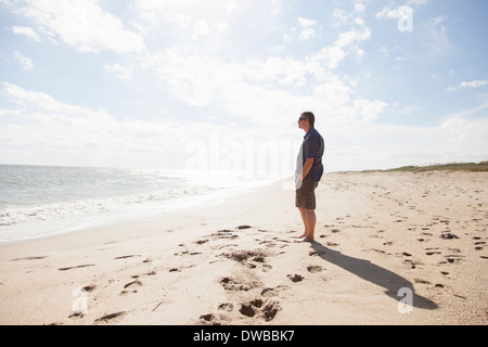 Man looking out to sea, Satellite Beach, Florida, US Stock Photo
