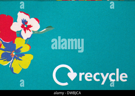 recycle logo on envelope with flowers on - disposal recycling recycle logo symbol Stock Photo