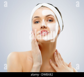 beauty women getting facial mask Stock Photo