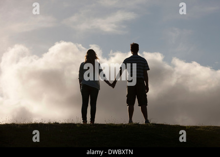 Couple holding hands Stock Photo