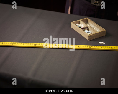 Still life of chalk and ruler in traditional tailors shop Stock Photo