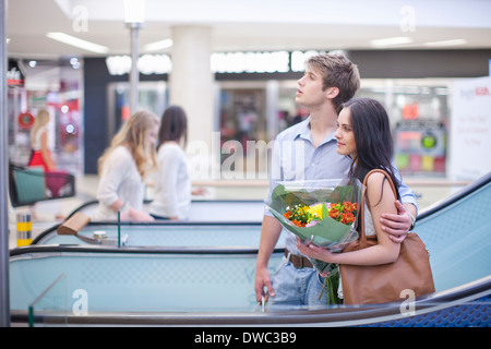 Young couple shopping in mall Stock Photo