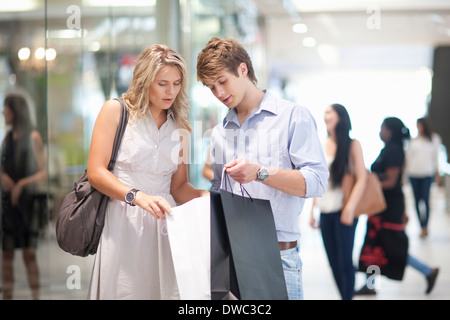 Young couple shopping in mall Stock Photo