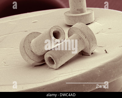 Coloured SEM of rivets Stock Photo