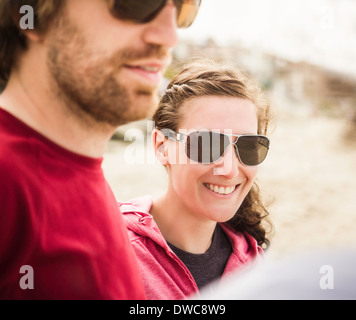 Close up of young couple at beach Stock Photo