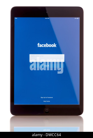 iPad Mini displaying start up screen of Facebook application Stock Photo