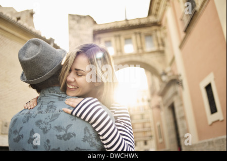 Young couple hugging, Valencia, Spain Stock Photo