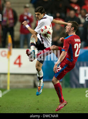 Prague, Czech Republic. 5th Mar, 2014. Tarik Elyounoussi from Norway (left) and Czech Republic's Vladimir Darida are seen during the friendly soccer match Czech Republic vs. Norway, in Prague, Czech Republic, on Wednesday, March 5, 2014. Credit:  Michal Kamaryt/CTK Photo/Alamy Live News Stock Photo