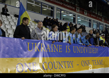 Cyprus, Larnaka- March 05,2014: Ukraine's fans hold a banner during the friendly game  between Ukraine  and USA at the Antonis Papadopoulos  stadium in Larnaka on March  05,2014 Credit:  Yiannis Kourtoglou/Alamy Live News Stock Photo