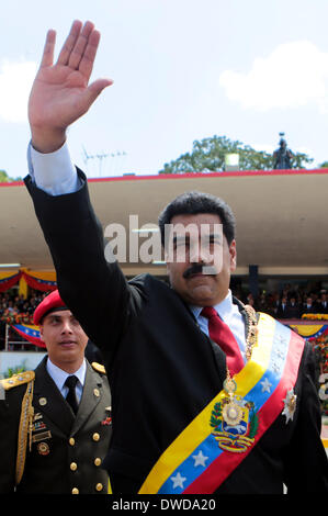 Caracas, Venezuela. 5th Mar, 2014. Venezuelan President Nicolas Maduro waves as he arrives to the civic-military parade in honor of late Venezuelan President Hugo Chavez, on the framework of the first anniversary of his death, at Paseo Los Proceres, in Caracas, Venezuela, on March 5, 2014. Credit:  AVN/Xinhua/Alamy Live News