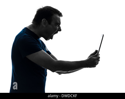one  man holding digital tablet screaming angry furious on white background Stock Photo