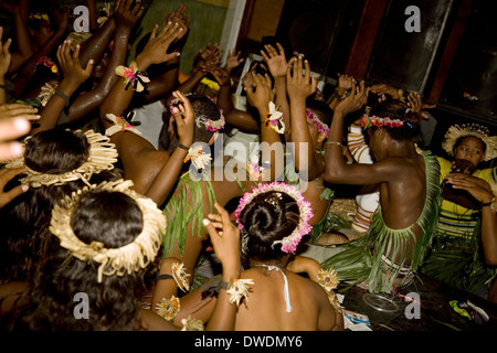 A Gilbertese dance group performs a Tamure dance at PT-109 Bar & Restaurant, Gizo, Ghizo Island, Solomon Islands Stock Photo