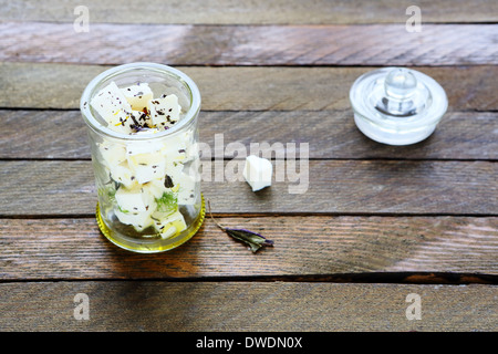 marinated feta in a jar, food closep Stock Photo