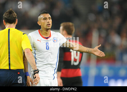 Stuttgart, Germany. 05th Mar, 2014. Chile's Arturo Vidal reacts during the international friendly match between Germany and Chile at Mercedes-Benz-Arena in Stuttgart, Germany, 05 March 2014. Photo: Andreas Gebert/dpa/Alamy Live News Stock Photo