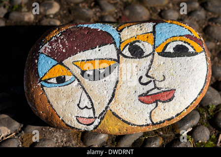 Portugal, Madeira, Santana, painted stone with lovers, close-up Stock Photo