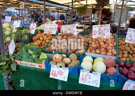 Display of fresh vegetables on a market traders stall England uk Stock Photo