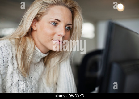 Businesswoman working on computer in office Stock Photo