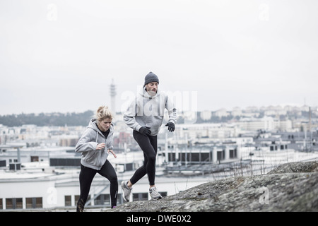 Sporty couple jogging together Stock Photo