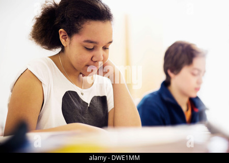 High school girl studying in class Stock Photo