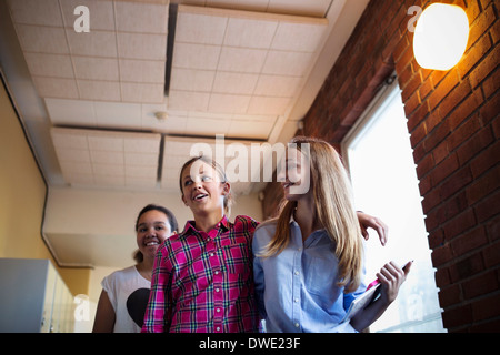 Low angle view of happy girls at school Stock Photo