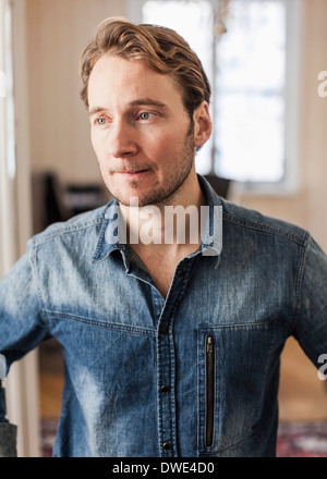 Thoughtful man looking away Stock Photo