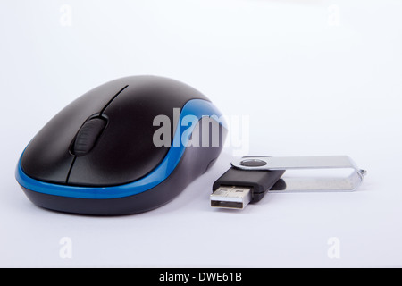 Pure white background with computer mouse and usb stick Stock Photo