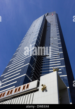The Eureka Tower, a tall skyscraper in Melbourne, Australia with two bee insect sculptures Stock Photo