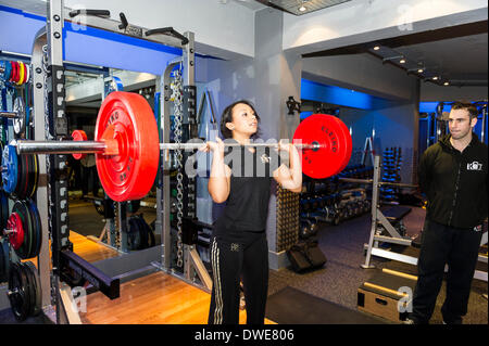 Birmingham NEC, UK. Thursday 6th March. 2014:  Zoe Smith, English weightlifter and Olympian at the launch of the BodyPowerExpo press conference.  Zoe, who is now a KBTEducation sponsored athlete and is working as part of the KBTEducation team, gave a series of demonstrations in weightlifting techniques coached by Sam Dovey..  Photographer; Gordon Scammell/Alamy Live News. Stock Photo