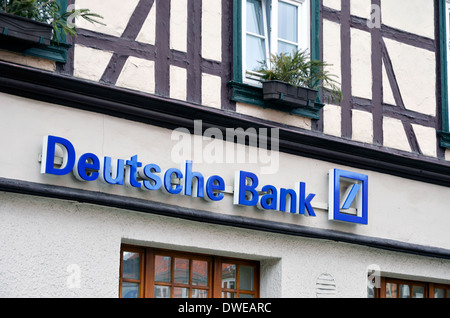Deutsche Bank sign and logo on a traditional building in Wernigerode. Deutsche Bank Zeichen und Logos Stock Photo