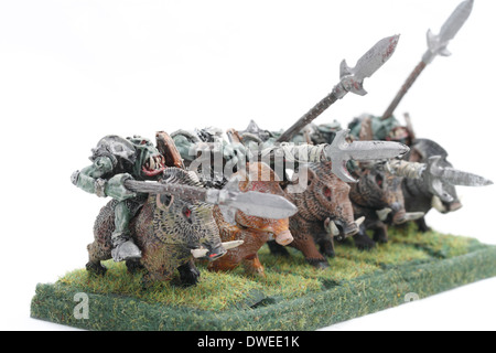 Orc Boar Boyz mounted on war Boars painted by photographer Stock Photo