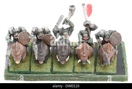 Orc Boar Boyz mounted on war Boars, with banner bearer and musican (horn) painted by photographer Stock Photo