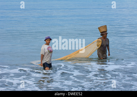 Women fishing, Maroantsetra Stock Photo