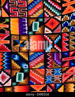 Colorful Peruvian fabrics on a market near Cuzco in Peru. Stock Photo