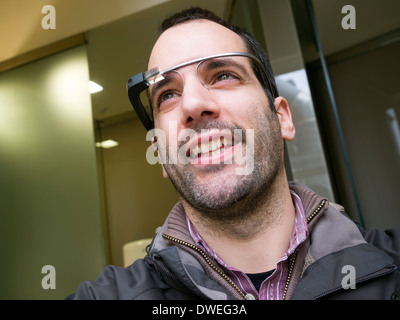 Young man wearing Google Glass