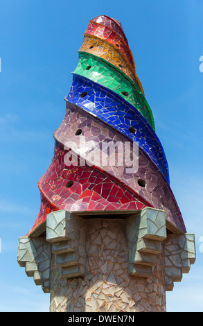 Ornate chimney designs on the roof of Gaudi's Neo-Gothic palace of Palau Guell - Barcelona - Catalonia region of Spain. Stock Photo