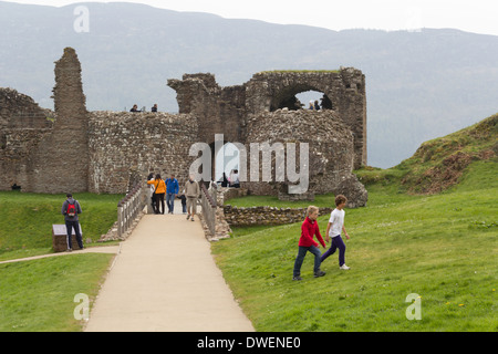 Tourists and the path at ruins of the Urquhart Castle in Scotland. Located along A82 on Loch Ness in the Scottish Highlands Stock Photo