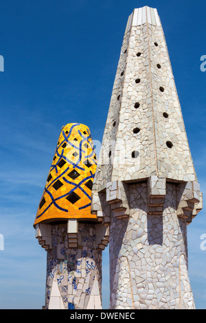 Ornate chimney designs on the roof of Gaudi's Neo-Gothic palace of Palau Guell - Barcelona - Spain Stock Photo