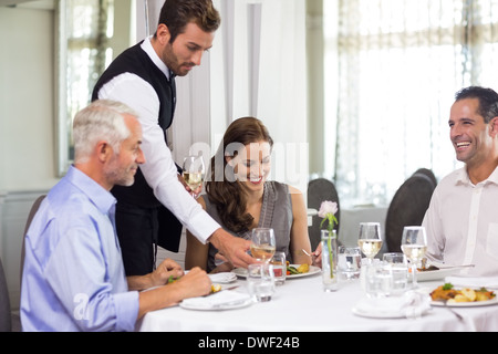 Business colleagues around dining table in restaurant Stock Photo