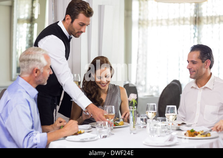 Business colleagues around dining table in restaurant Stock Photo