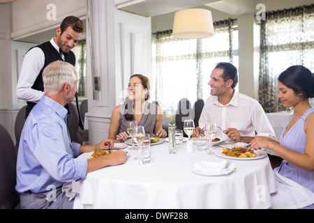 Business colleagues around dining table in restaurant Stock Photo