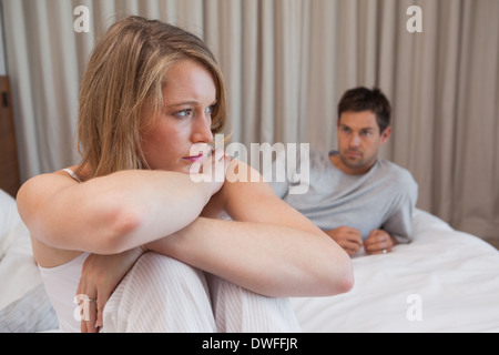 Couple not talking after an argument in bed Stock Photo