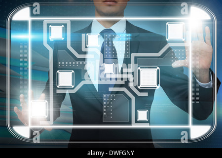 Businessman touching interface Stock Photo