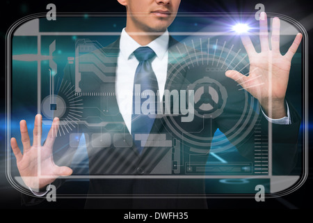 Businessman touching interface Stock Photo