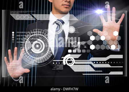 Businessman touching interface Stock Photo