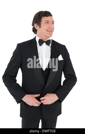 Groom in tuxedo getting ready Stock Photo