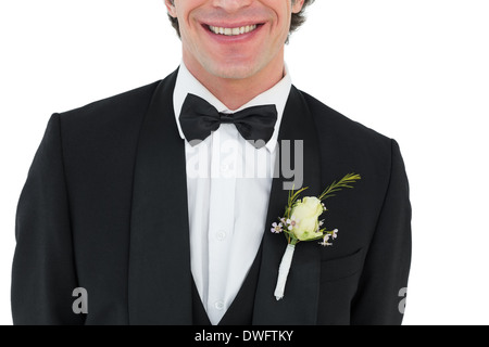 Mid section of groom smiling Stock Photo