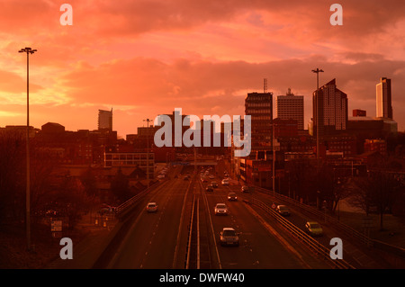 traffic trails of traffic heading too and from the city of leeds at dusk leeds yorkshire uk Stock Photo