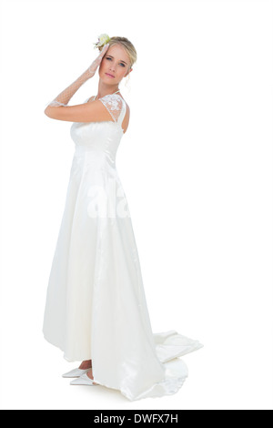 Portrait of bride posing over white background Stock Photo